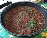 Une image de l'étape 18 de Dahl de lentilles jaunes aux carottes violettes, tomates et courgette.