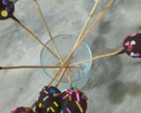 A picture of step 6 of 1 bite chocolatey marshmallow pops.