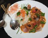 A picture of step 6 of Kungpao chicken with fried rice.