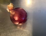 A picture of step 2 of Endive Salad with Cucumber and Red Onion in Chive Dressing.