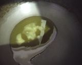A picture of step 5 of Gobhi mussalam.