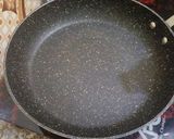 A picture of step 14 of Chicken tandoori tikka boti in frying pan.