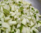 A picture of step 2 of Meethi Keri sabji (sweet raw mango curry).