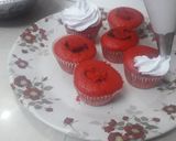 A picture of step 4 of Red cup cakes with chocolate center.
