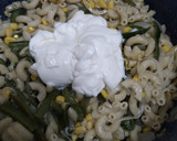 Foto del paso 7 de la receta: Pasta codito con rajas de poblano, queso, elote y crema