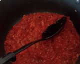 A picture of step 2 of Meat balls in tomato Concasee' with stir fried rice.