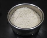 A picture of step 1 of Tomato Rice In Presser Cooker.