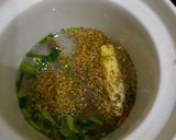 Foto langkah ke 3 dari resep Mpasi 7m+ Bubur Gurih Ikan Tilapia.