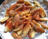 A picture of step 2 of Potatoe wedges#4week challenge# charity challenge.