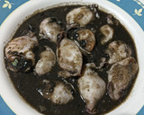 Foto del paso 10 de la receta: Chipirones en su tinta rellenos de langostinos