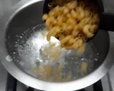 A picture of step 1 of Masala macaroni.