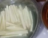 A picture of step 1 of Turmeric fried yam.