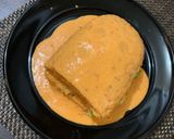A picture of step 5 of Torta Ahogada with Red Sauce.