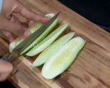 Foto langkah ke 3 dari resep Es Jeruk Timun Serut.