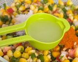 A picture of step 10 of Loaded Fusion Mexican Corn Chaat Jars 🌽🧀.