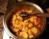 Foto del paso 7 de la receta: Patatas con ajos y pescado con pimientos picantes