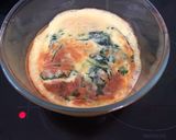 A picture of step 2 of Baked eggs and spinach.