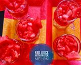 A picture of step 7 of Street style water melon with red juice.