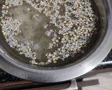 A picture of step 1 of Mix millet khichdi with vegetables.