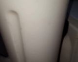 A picture of step 2 of Iced banana shake with rooh afza 😋😋😍😍.