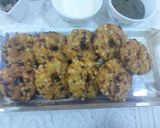 A picture of step 3 of Sabudana vada donut with sweet curd and mint chutney.