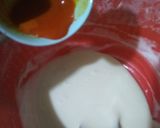 A picture of step 6 of Orange Marble Swiss Roll.