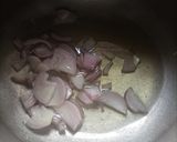 A picture of step 1 of Aloo chane ki tahiri.