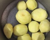 A picture of step 1 of Achari Aloo.