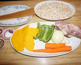 A picture of step 2 of Porotos con Riendas with Smoked Ham.