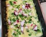 A picture of step 4 of Fluffy and Soft Takoyaki in a Tamagoyaki Pan.
