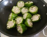 A picture of step 4 of Punjabi Paneer stuffed Capsicum in Red Gravy.