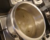 A picture of step 2 of Meva rice (jaggery) (dry fruits rice).