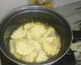 Foto langkah ke 5 dari resep Kentang goreng keriting.