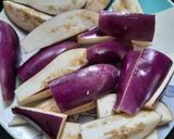 A picture of step 2 of Banana flowers dip in mustard seeds.