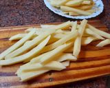 Foto del paso 2 de la receta: Chuleta de Cerdo con Revuelto de Arvejas y Fritas