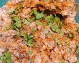 A picture of step 2 of Galouti kebab on crispy naan.