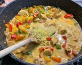 Une image de l'étape 26 de Poulet au lait de coco et poivrons.