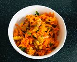 A picture of step 4 of Bombay walnut Carrot Salad with cashews.
