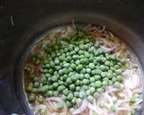 A picture of step 1 of Tomato rice with peas.