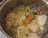 A picture of step 10 of Easy One-Pot Boiled Dumplings in Chicken Broth.