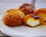 A picture of step 8 of Cream Cheese Filled Sweet Pumpkin Cakes.