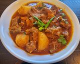 A picture of step 4 of Spicy Mutton Masala or Aloo Gosht.