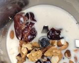 A picture of step 2 of Power pack banana shake with dry fruit.