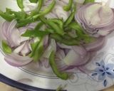 A picture of step 3 of Dry Chicken chilli.