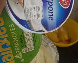 A picture of step 2 of Honey sweetened double Cream and cream cheese.
