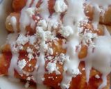 A picture of step 4 of Entomatadas in Red Sauce.