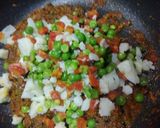 A picture of step 3 of Tava pulav.
