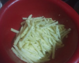 Foto del paso 2 de la receta: Hot dog enrollado y frito con papas fritas