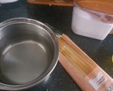 A picture of step 1 of Spaghetti with tomato sauce and cheddar cheese 😍.