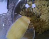 A picture of step 7 of Choco orange eclair with fresh cream...cup of hot chocolate.